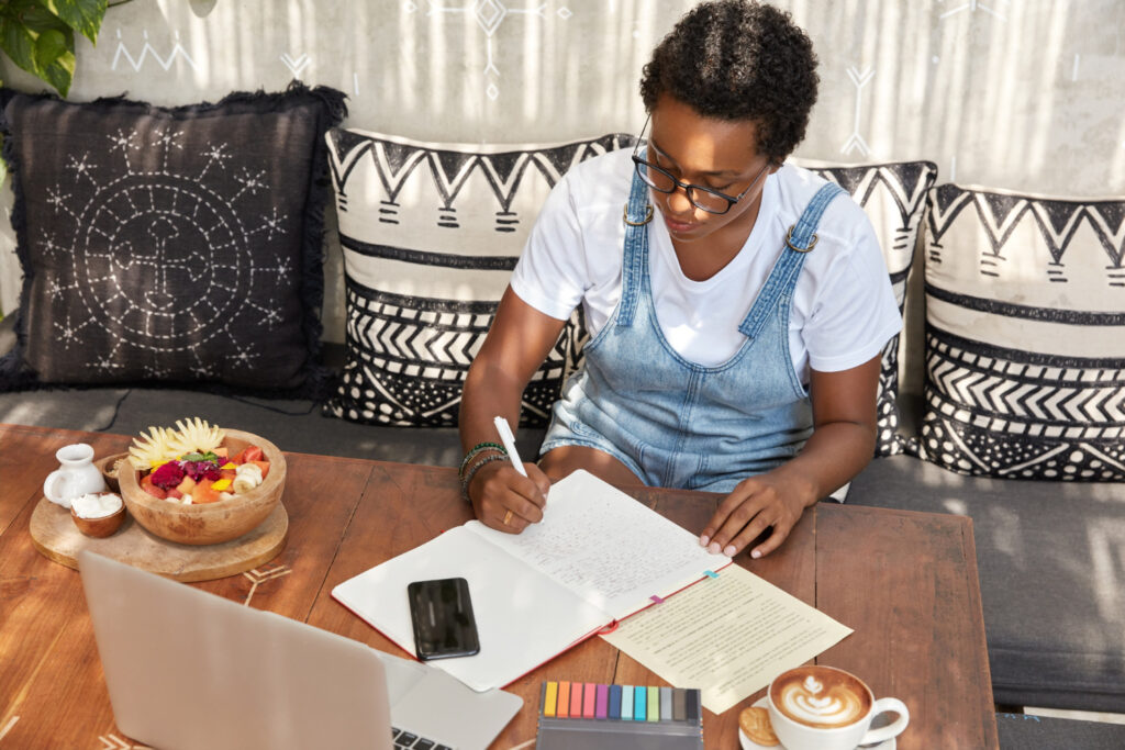 top view pensive black student with short hairstyle